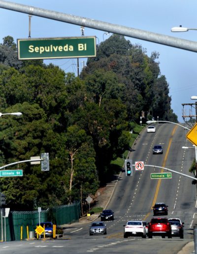 NWS_TDB-L-PCH-0603 Old Sepulveda Blvd street sign seen at 8 AM, looking west on El Segundo Blvd., before being replaced two hours later. As the City of El Segundo changes it's appeal as a beach city, a two mile stretch of Sepulveda Blvd through town is being changed to Pacific Coast Highway, Saturday, June 1, 2018. (photo by Mike Mullen